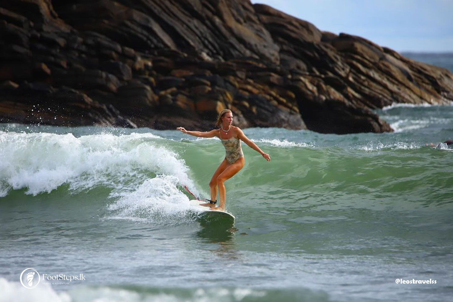 Surfing girl at the Hiriketiya Beach, Best Beaches in Sri Lanka