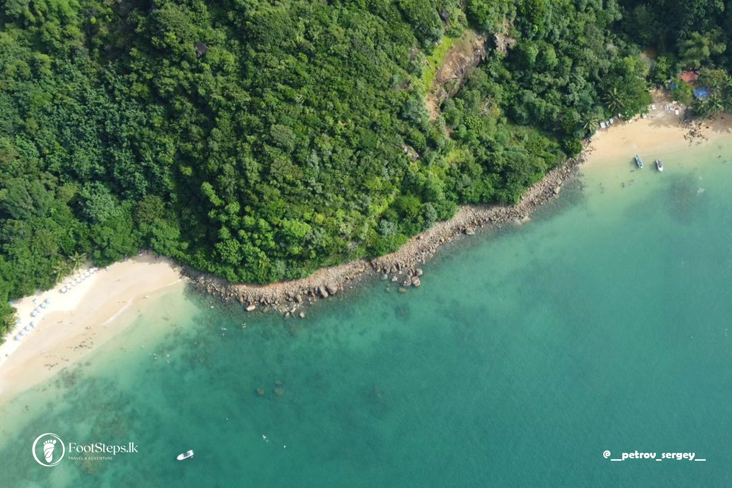Drone shot of Crystal Clear Water with Jungle Beach Unawatuna, Best Beaches in Sri Lanka