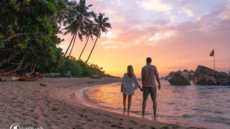 Couple looking at the Sunset of Mirissa Secret Beach, Best Beaches in Sri Lanka