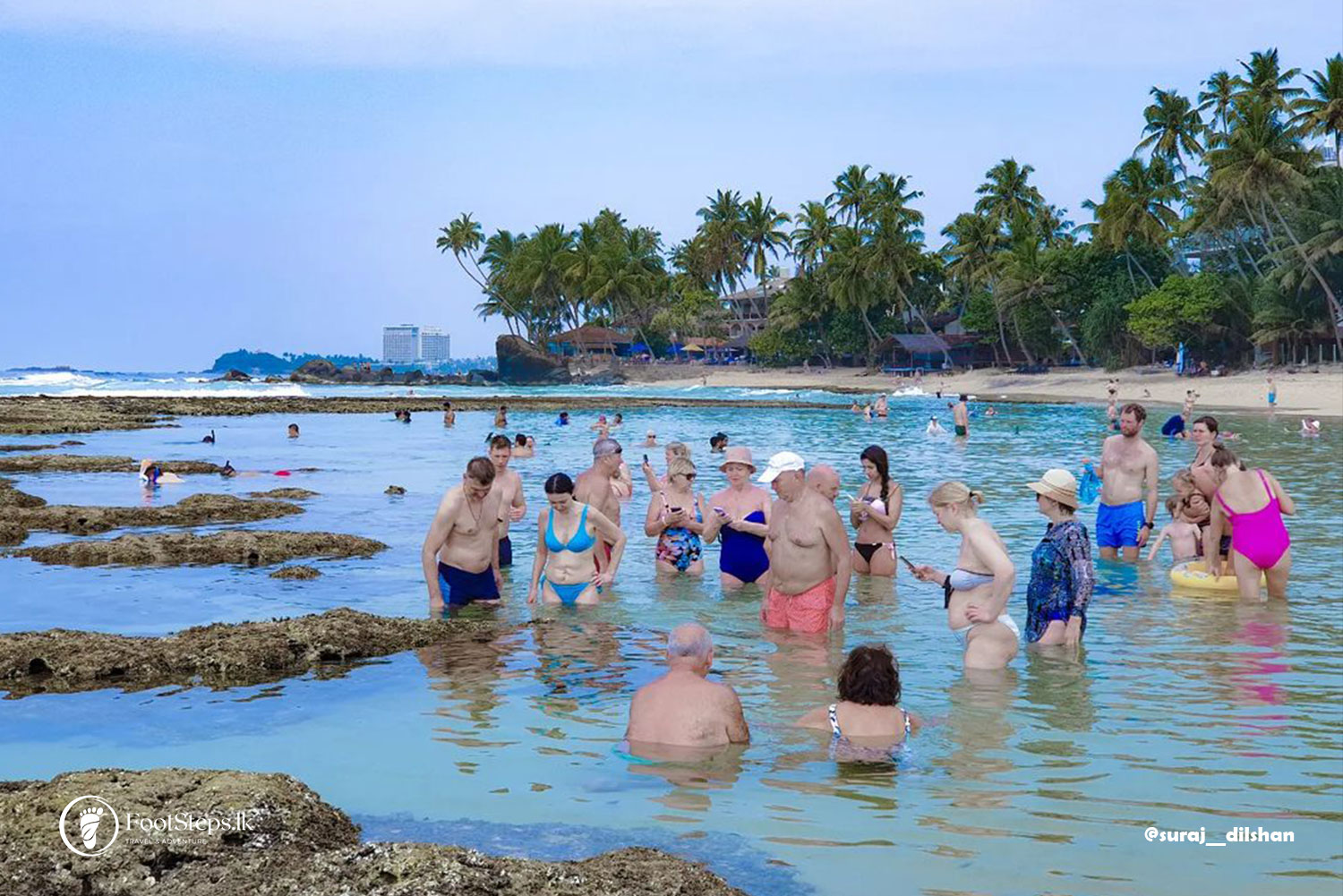 Group of tourist swimming at Wijaya Beach, Best Beaches in Sri Lanka